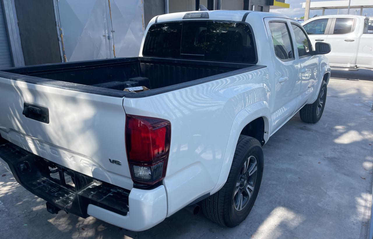 Photo 4 from auction – 2018 TOYOTA TACOMA DOU with VIN 3TMAZ5CN2JM067390