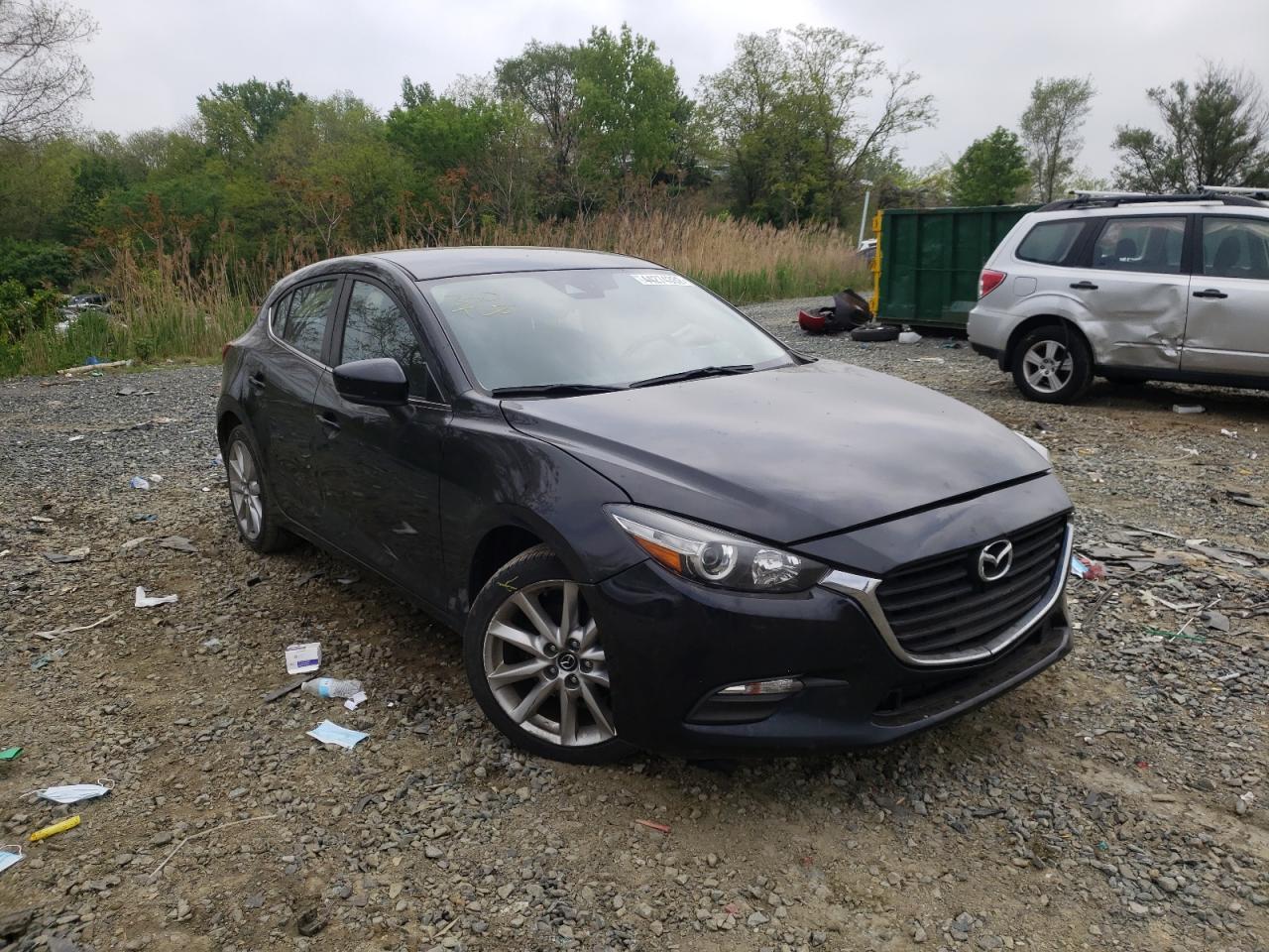 MAZDA 3 TOURING 2017 with VIN JM1BN1L78H1128758 - Photo from auction