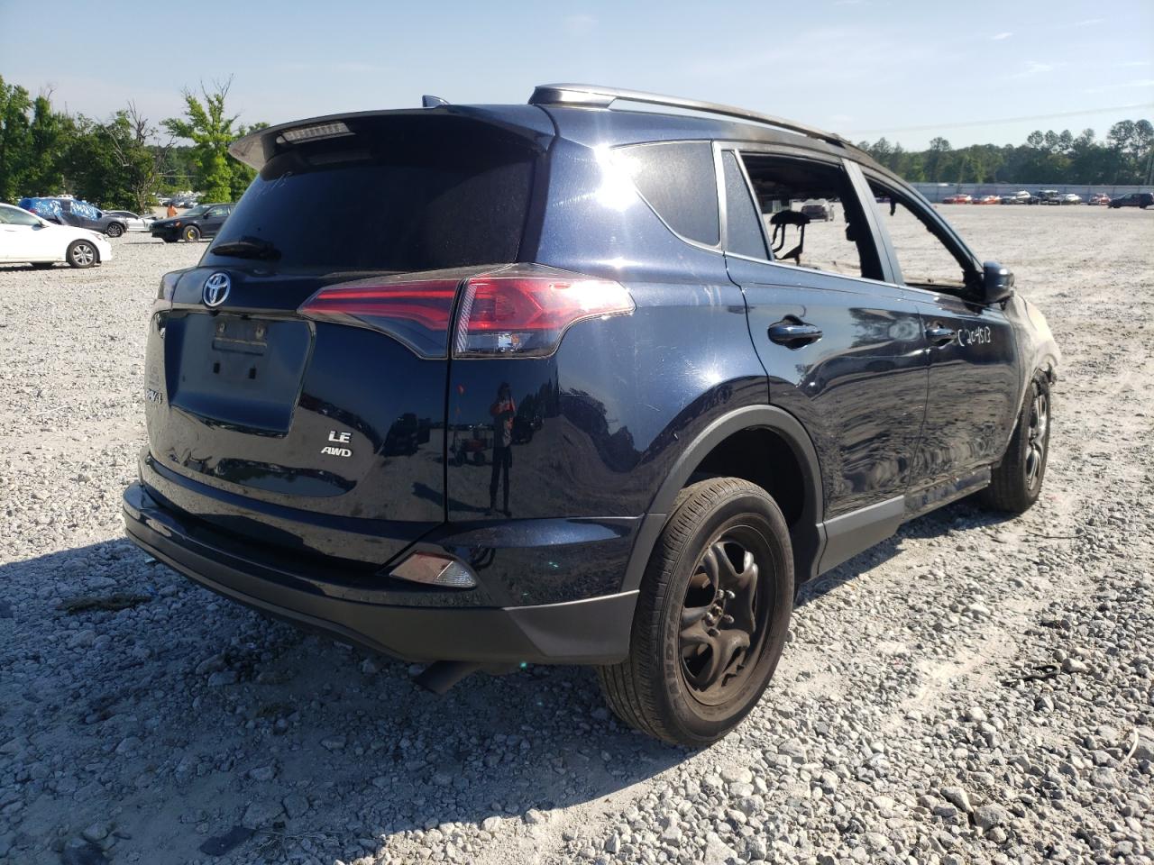 Photo 4 from auction – 2017 TOYOTA RAV4 LE with VIN JTMBFREV1HJ715536