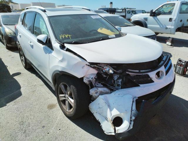 TOYOTA RAV4 XLE 2014 with VIN JTMWFREV5EJ018741 - Photo from auction