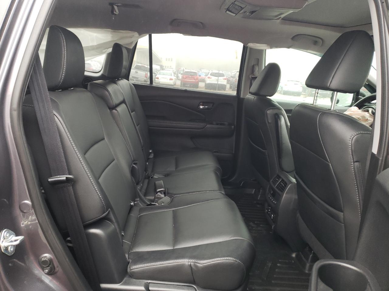 Photo 6 from auction – 2018 HONDA PILOT TOUR with VIN 5FNYF6H9XJB012134