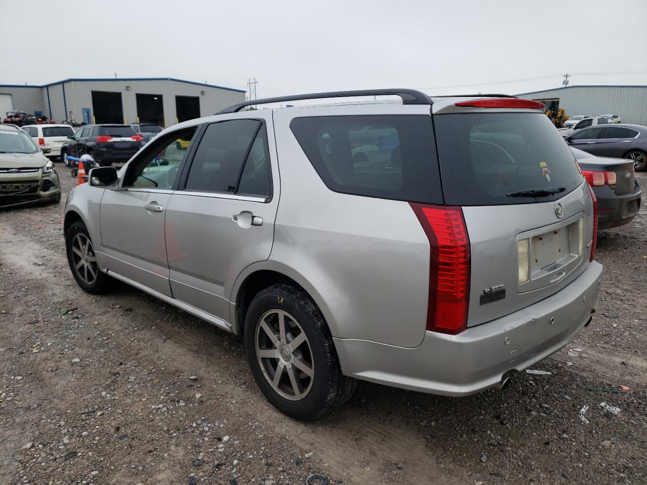 Фото 3 с аукциона – 2004 CADILLAC SRX с VIN 1GYDE63A140136471