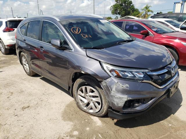 Photo 1 from auction – 2015 HONDA CR-V EXL with VIN 2HKRM3H76FH537174