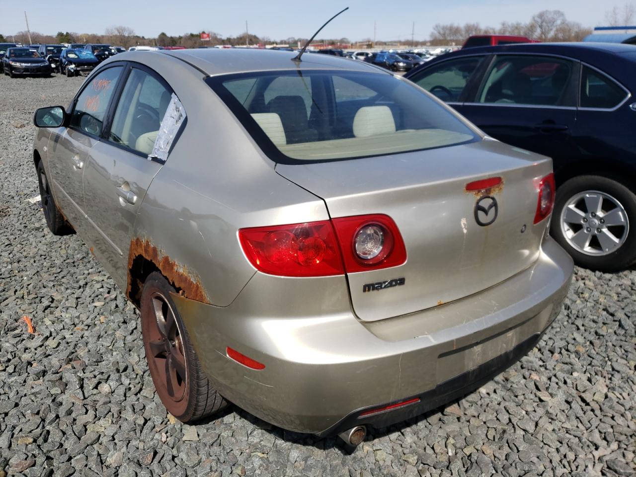 Photo 3 from auction – 2004 MAZDA MAZDA3 with VIN JM1BK12FX41169355