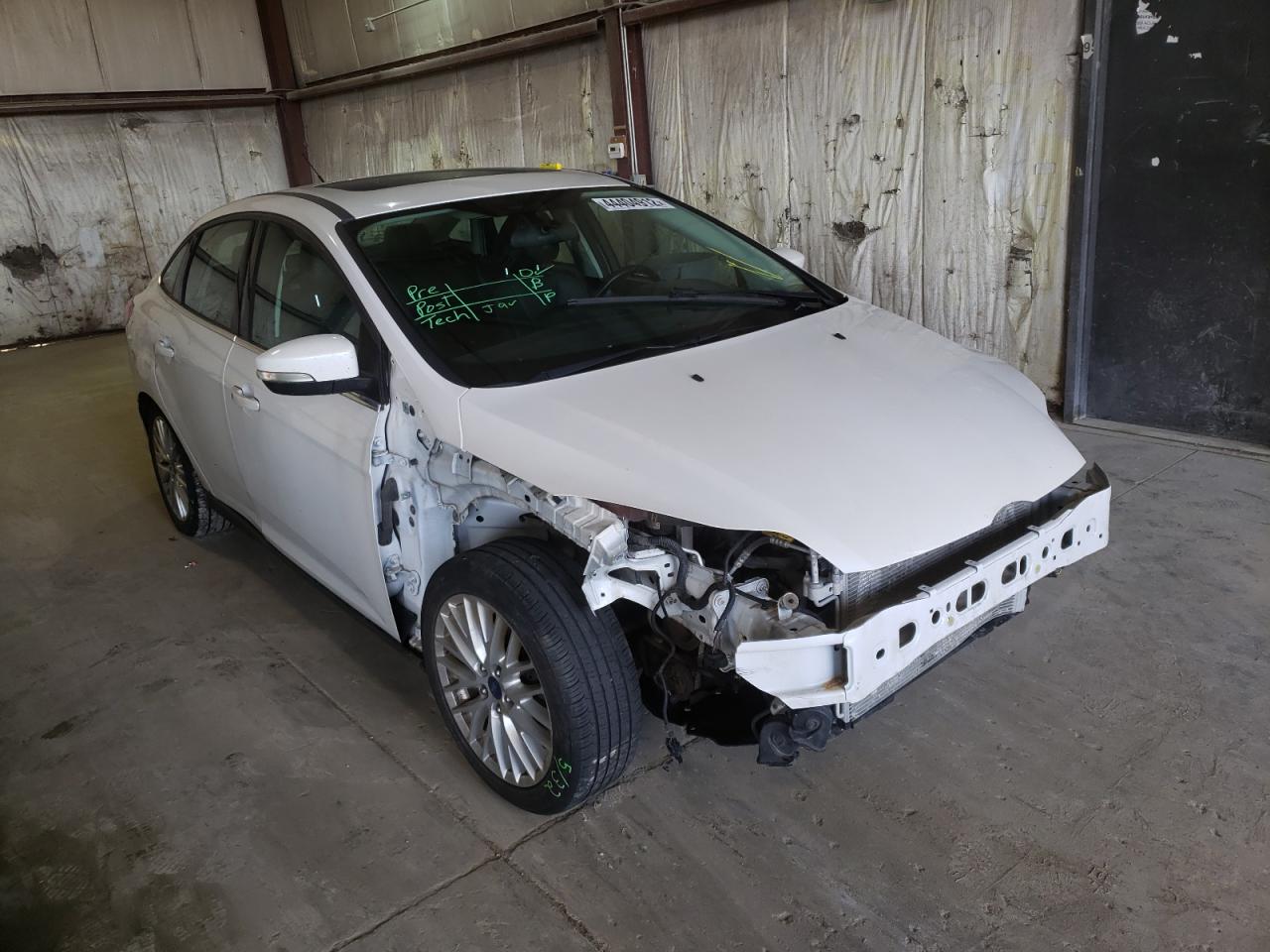 FORD FOCUS TITA 2014 with VIN 1FADP3J27EL234517 - Photo from auction