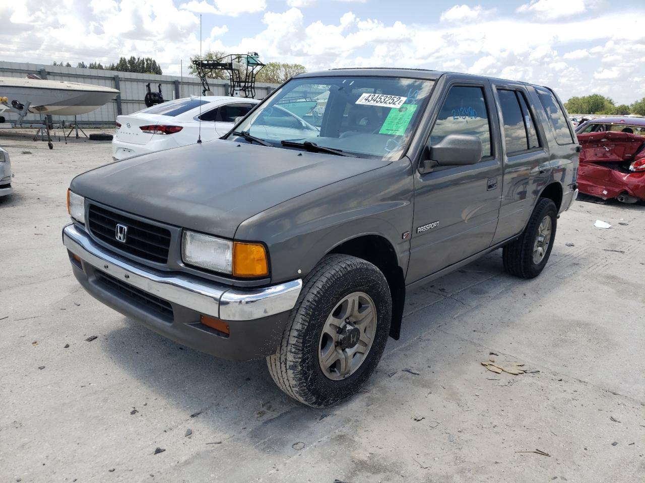 Photo 2 from auction – 1997 HONDA PASSPORT E with VIN 4S6CK58V6V4415752