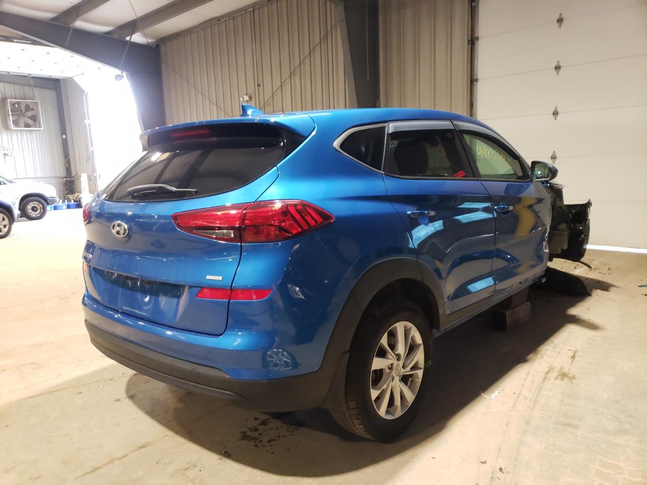 Photo 4 from auction – 2019 HYUNDAI TUCSON SE with VIN KM8J2CA47KU963096