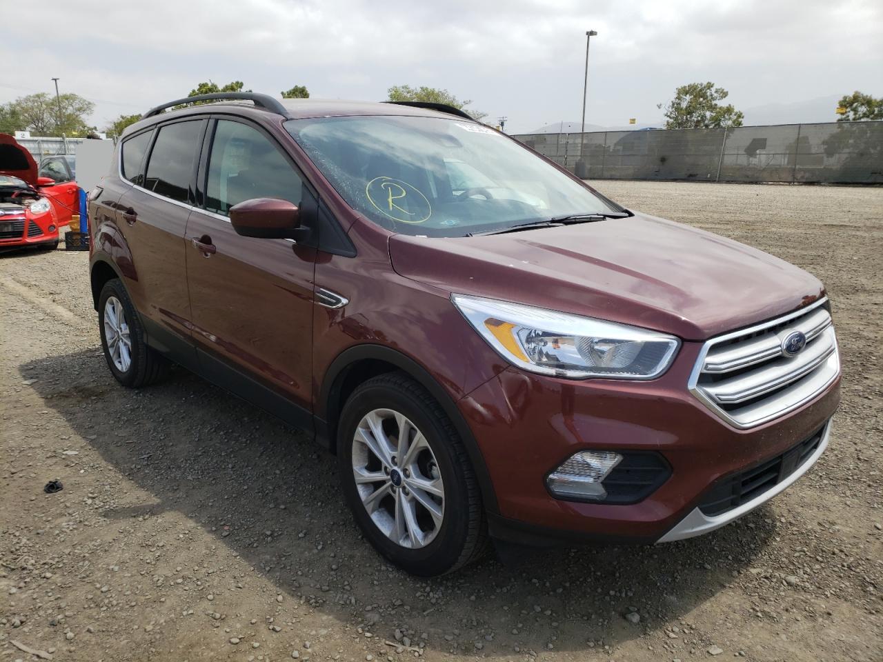 FORD ESCAPE SE 2018 with VIN 1FMCU0GD6JUC32506 - Photo from auction