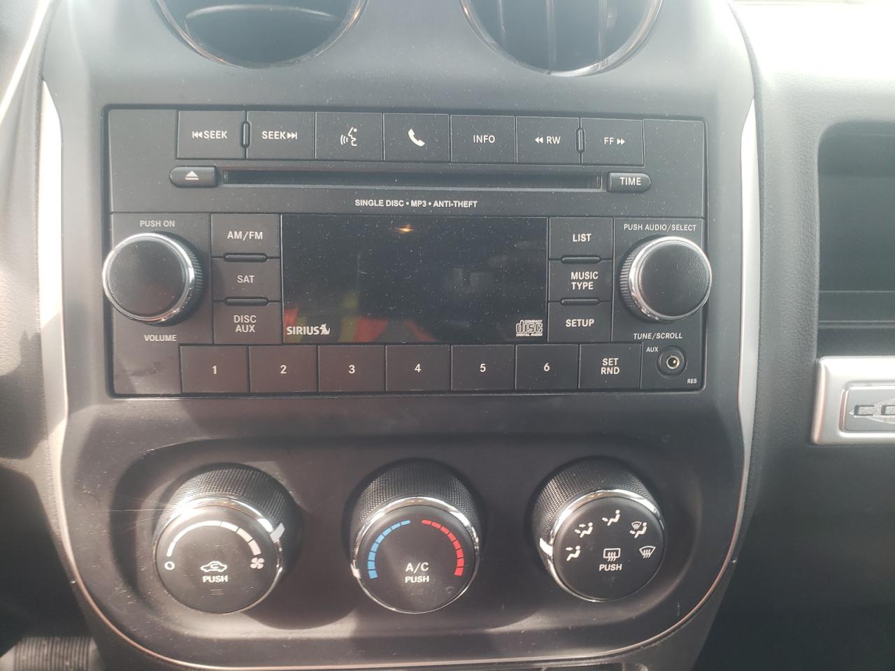 Photo 9 from auction – 2015 JEEP COMPASS LA with VIN 1C4NJDEB8FD408915