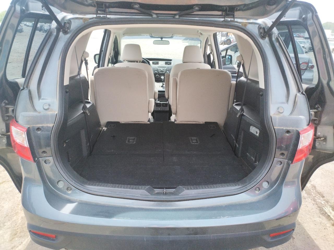 Photo 9 from auction – 2012 MAZDA 5 with VIN JM1CW2CLXC0141952