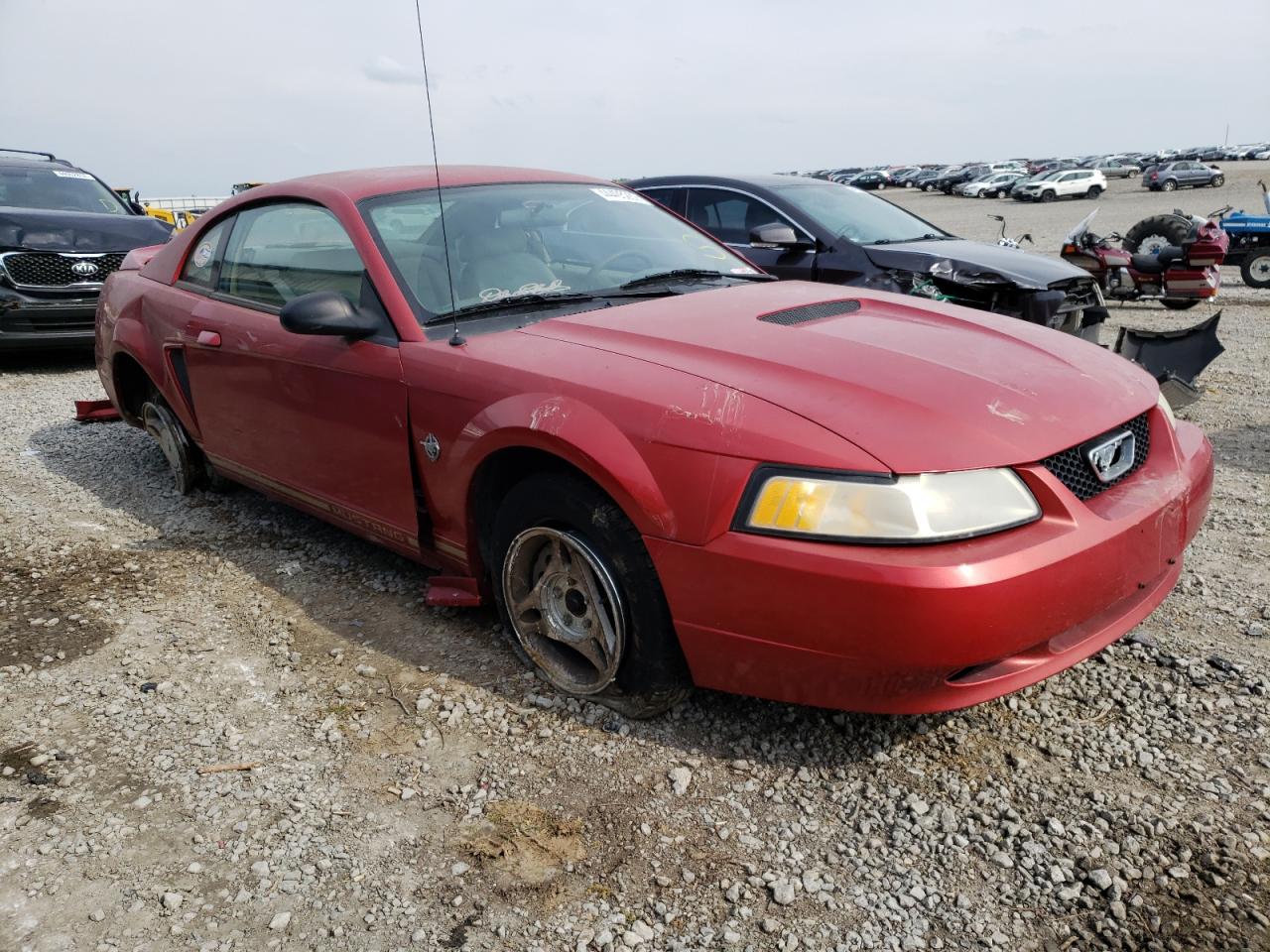 FORD MUSTANG 1999 with VIN 1FAFP4049XF226423 - Photo from auction