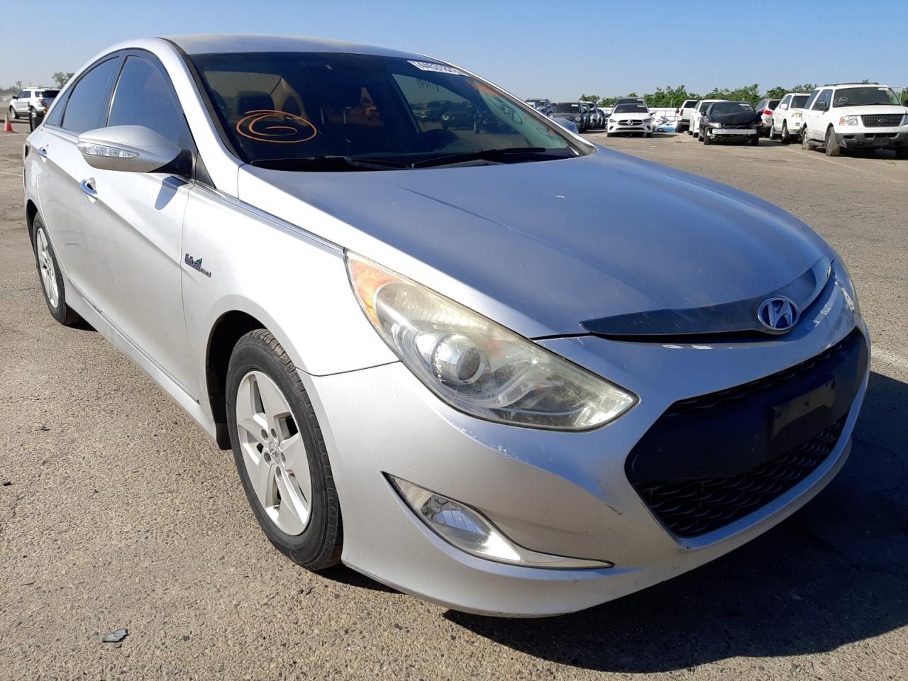 HYUNDAI SONATA HYB 2011 with VIN KMHEC4A41BA001995 - Photo from auction