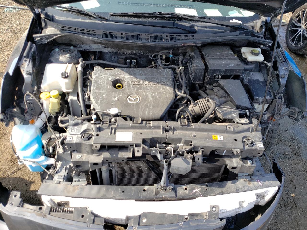 Photo 7 from auction – 2015 MAZDA 5 SPORT with VIN JM1CW2BL0F0184041