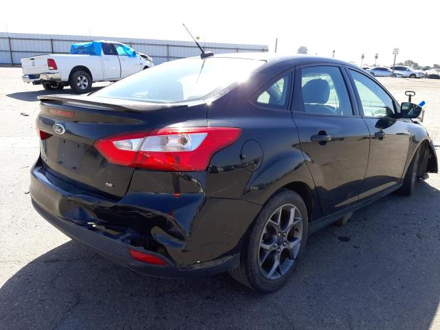 Фото 4 с аукциона – 2014 FORD FOCUS SE с VIN 1FADP3F21EL255128