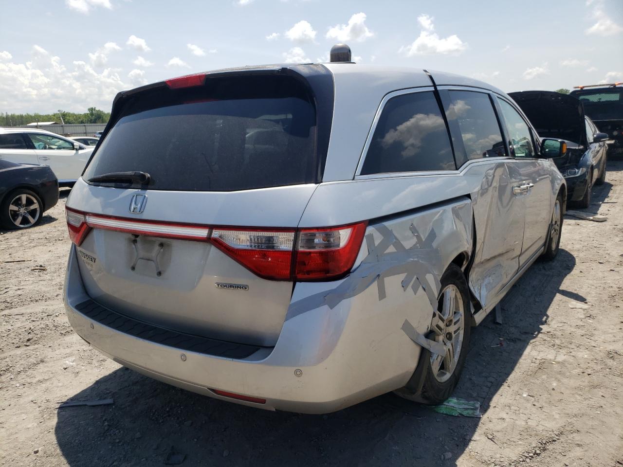 Photo 4 from auction – 2011 HONDA ODYSSEY TO with VIN 5FNRL5H98BB039616