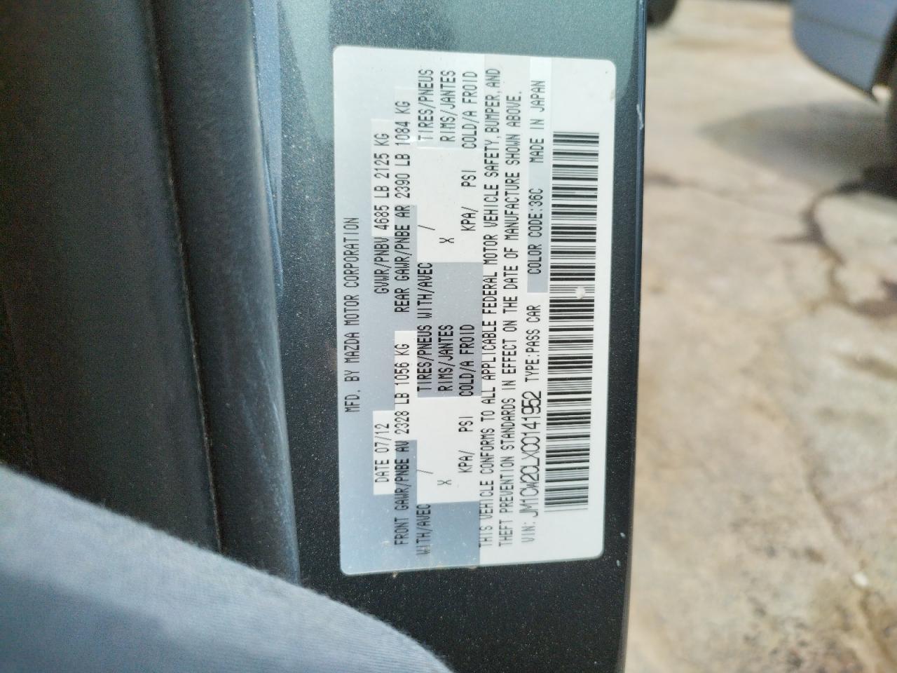 Photo 10 from auction – 2012 MAZDA 5 with VIN JM1CW2CLXC0141952