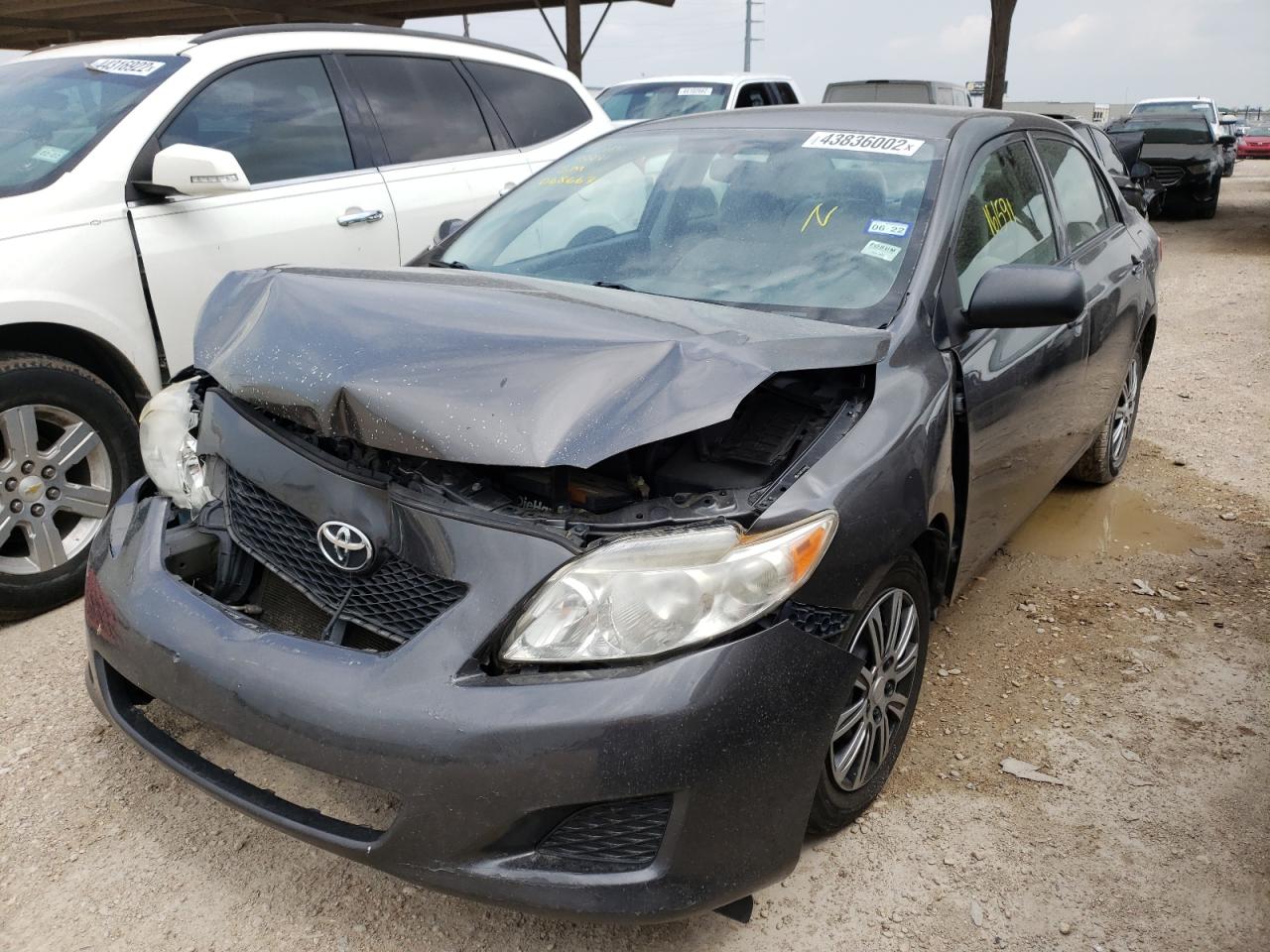 Photo 2 from auction – 2010 TOYOTA CARROLLA with VIN JTDBU4EE6AJ068663