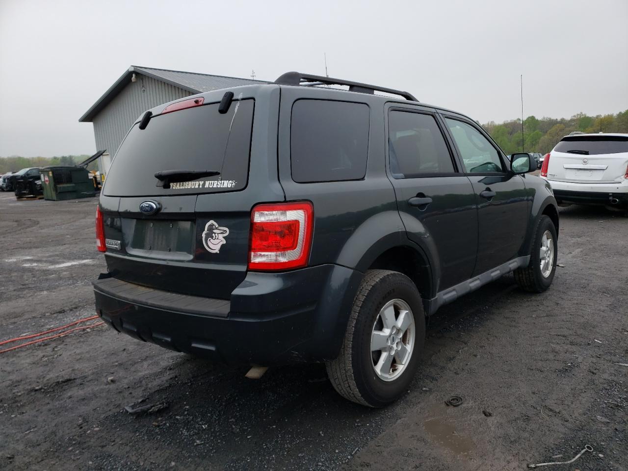 Photo 4 from auction – 2009 FORD ESCAPE XLT with VIN 1FMCU03G09KD13752