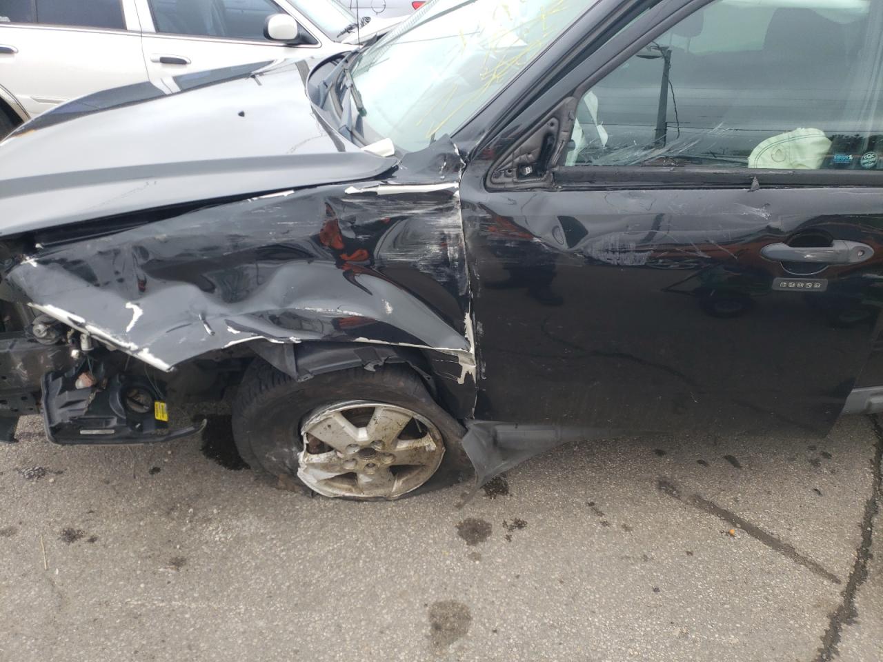 Photo 9 from auction – 2011 FORD ESCAPE XLT with VIN 1FMCU9DG2BKA41066