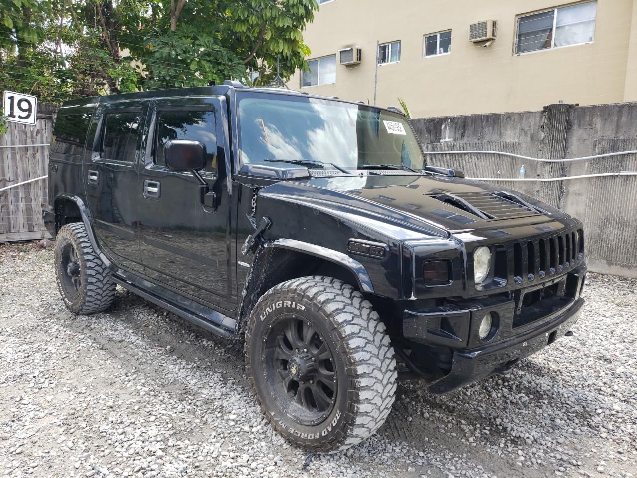 HUMMER H2 2003 with VIN 5GRGN23UX3H141351 - Photo from auction