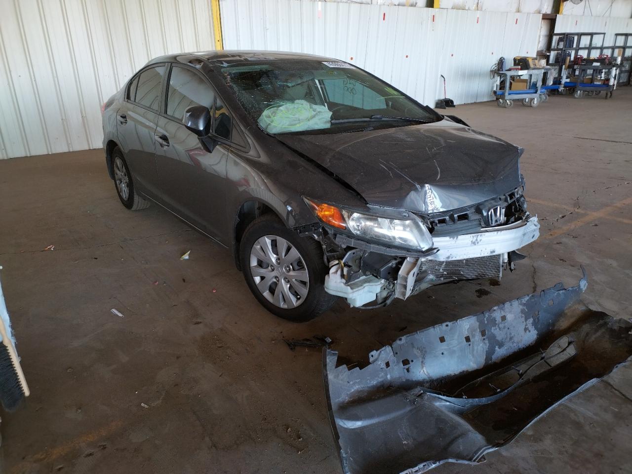 HONDA CIVIC LX 2012 with VIN 19XFB2F51CE090418 - Photo from auction