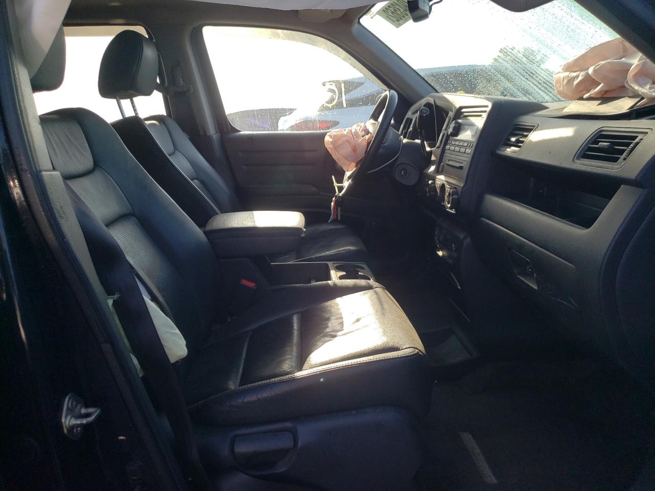 Photo 5 from auction – 2014 HONDA RIDGELINE with VIN 5FPYK1F53EB006509