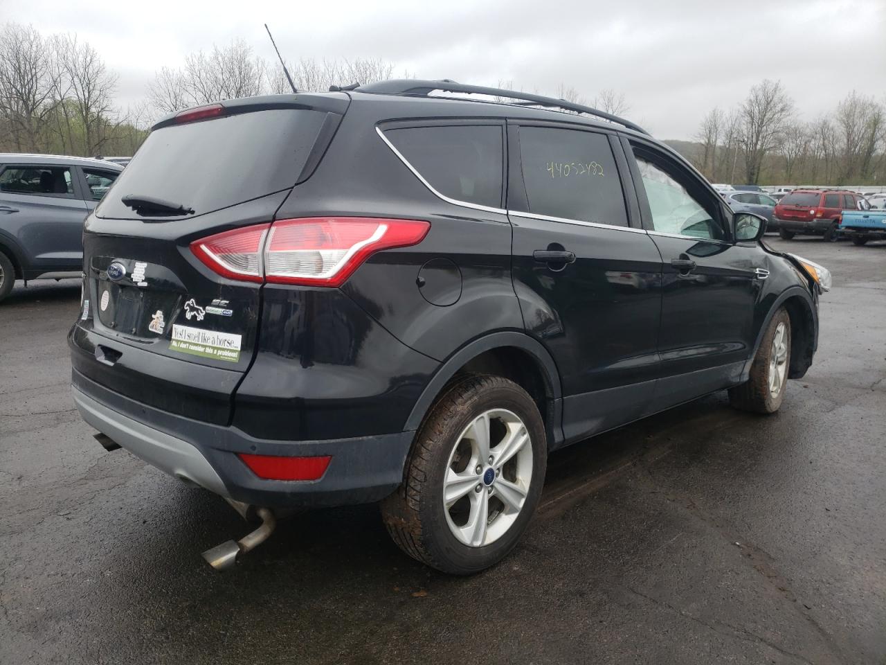Photo 4 from auction – 2016 FORD ESCAPE SE with VIN 1FMCU9G97GUC32569