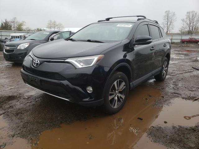 Photo 2 from auction – 2016 TOYOTA RAV4 XLE with VIN 2T3RFREVXGW532991