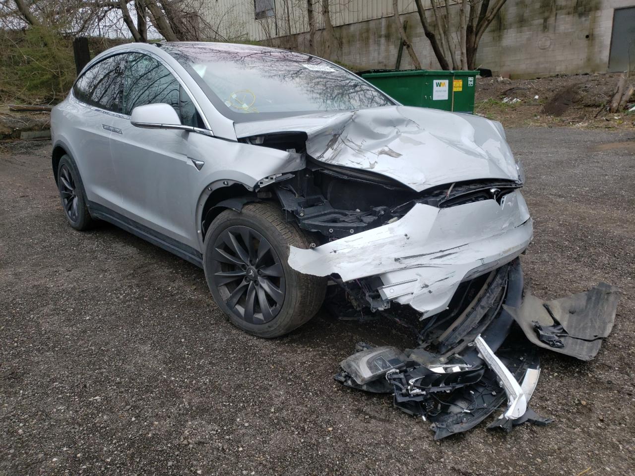 TESLA MODEL X 2018 with VIN 5YJXCBE25JF122383 - Photo from auction