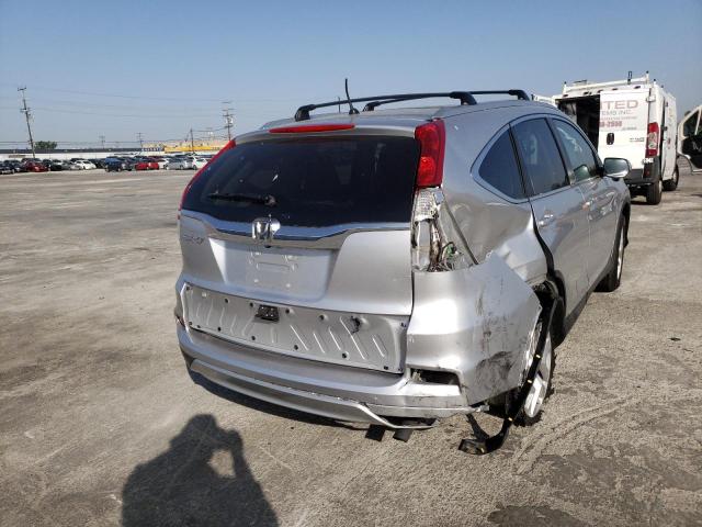 Photo 4 from auction – 2015 HONDA CR-V EX with VIN 2HKRM3H56FH532507