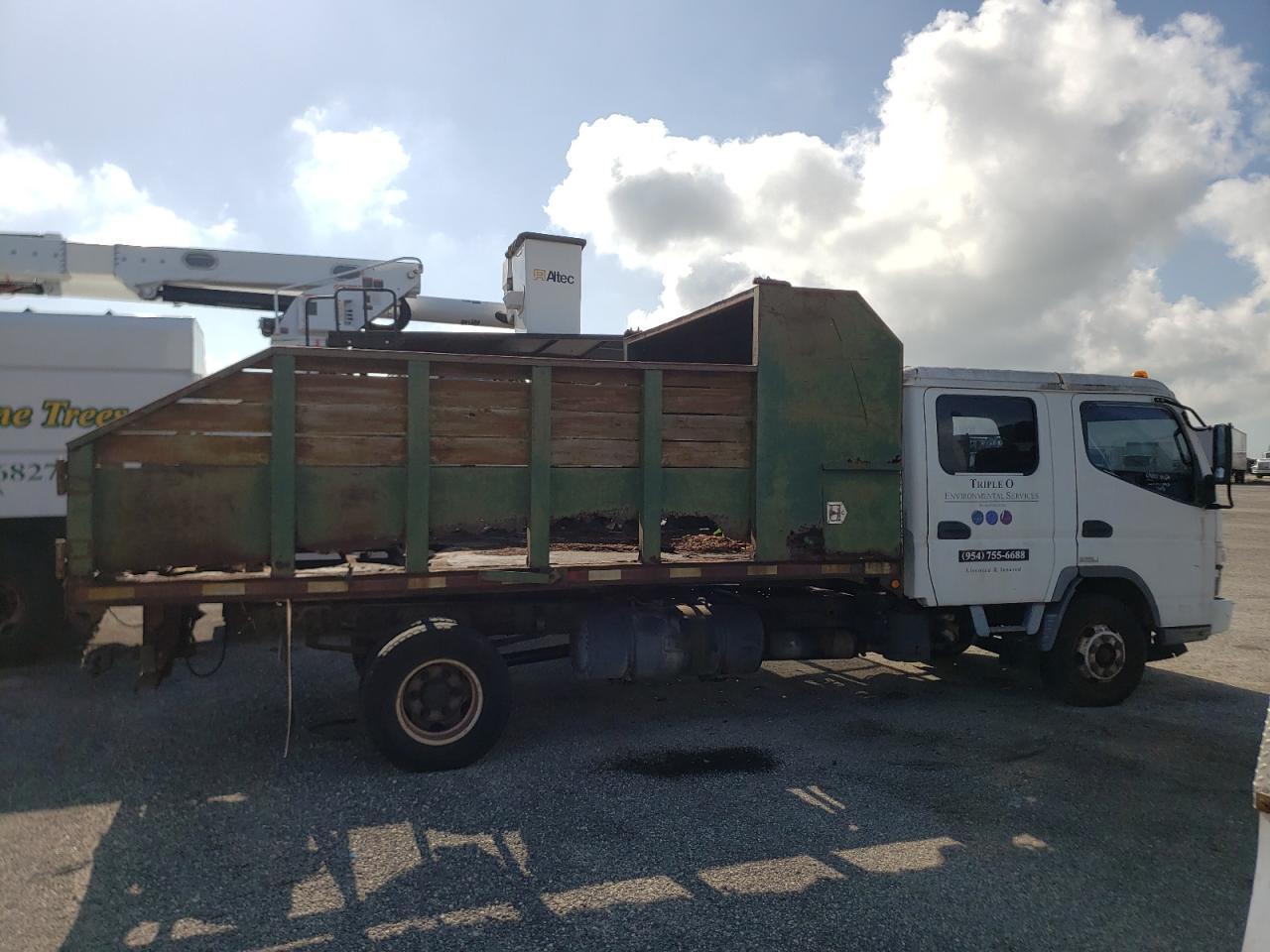 Photo 9 from auction – 2005 MITSUBISHI FE140 with VIN JL6BDH1S05K009148