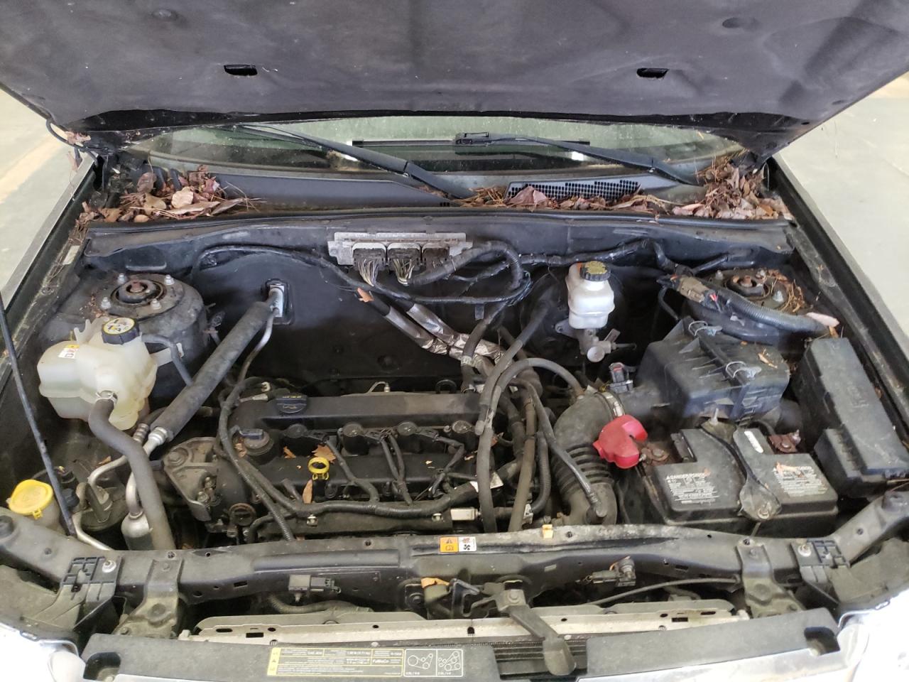 Photo 7 from auction – 2009 FORD ESCAPE LIM with VIN 1FMCU047X9KA19502
