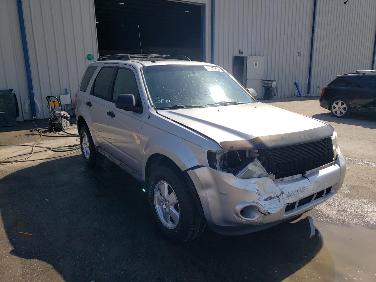 FORD ESCAPE XLT 2011 with VIN 1FMCU0DG5BKC70420 - Photo from auction