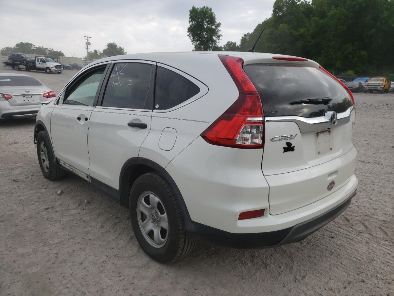 Photo 3 from auction – 2015 HONDA CR-V LX with VIN 5J6RM3H30FL025428