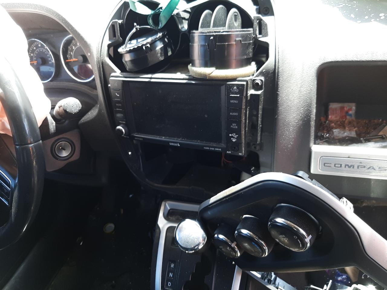 Photo 9 from auction – 2014 JEEP COMPASS LA with VIN 1C4NJCEB0ED883256