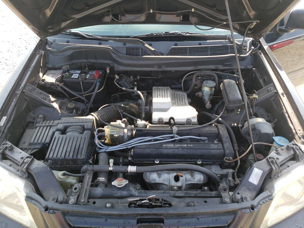 Photo 7 from auction – 2000 HONDA CR-V LX with VIN JHLRD2847YC013095