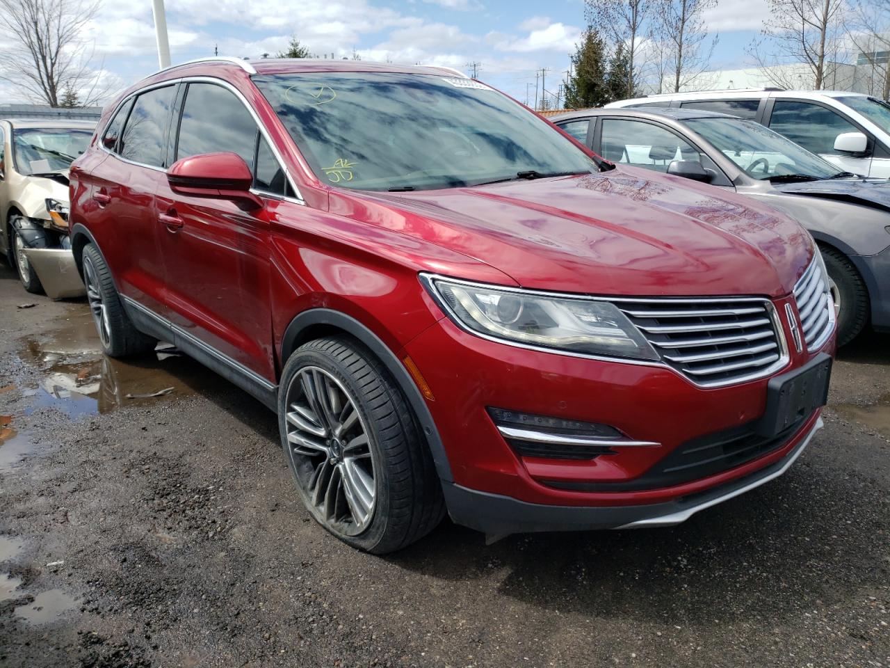 LINCOLN MKC 2015 with VIN 5LMTJ2AH2FUJ27742 - Photo from auction