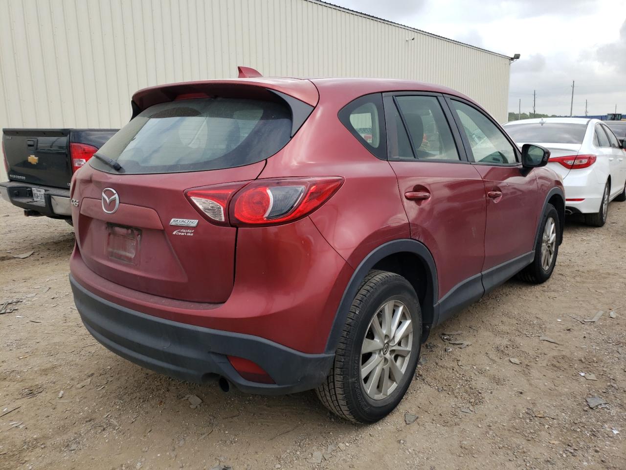 Photo 4 from auction – 2013 MAZDA CX-5 SPORT with VIN JM3KE2BE0D0148533