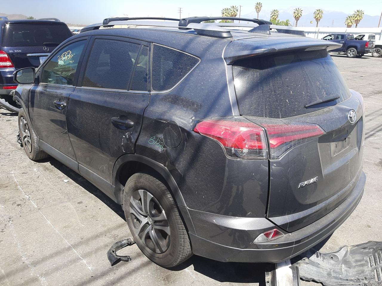 Photo 3 from auction – 2018 TOYOTA RAV4 LE with VIN 2T3ZFREV8JW485760