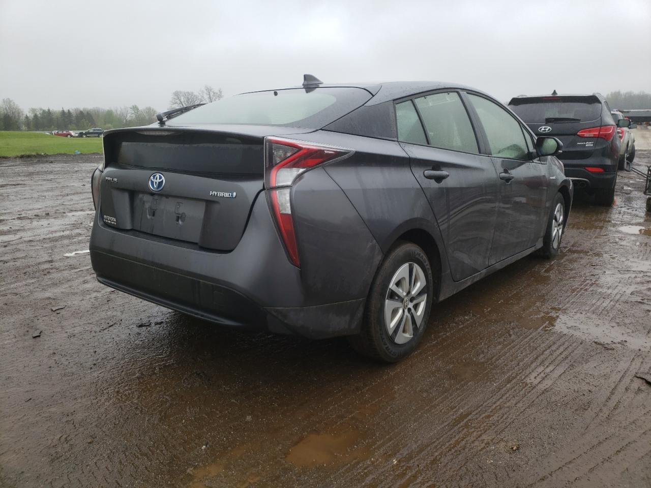 Photo 4 from auction – 2016 TOYOTA PRIUS with VIN JTDKARFUXG3003274