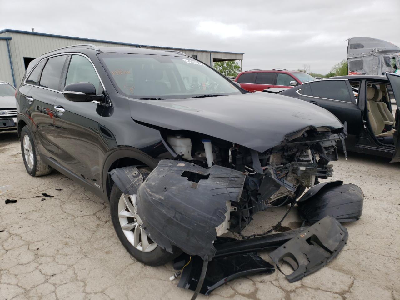 KIA SORENTO LX 2016 with VIN 5XYPGDA36GG148281 - Photo from auction