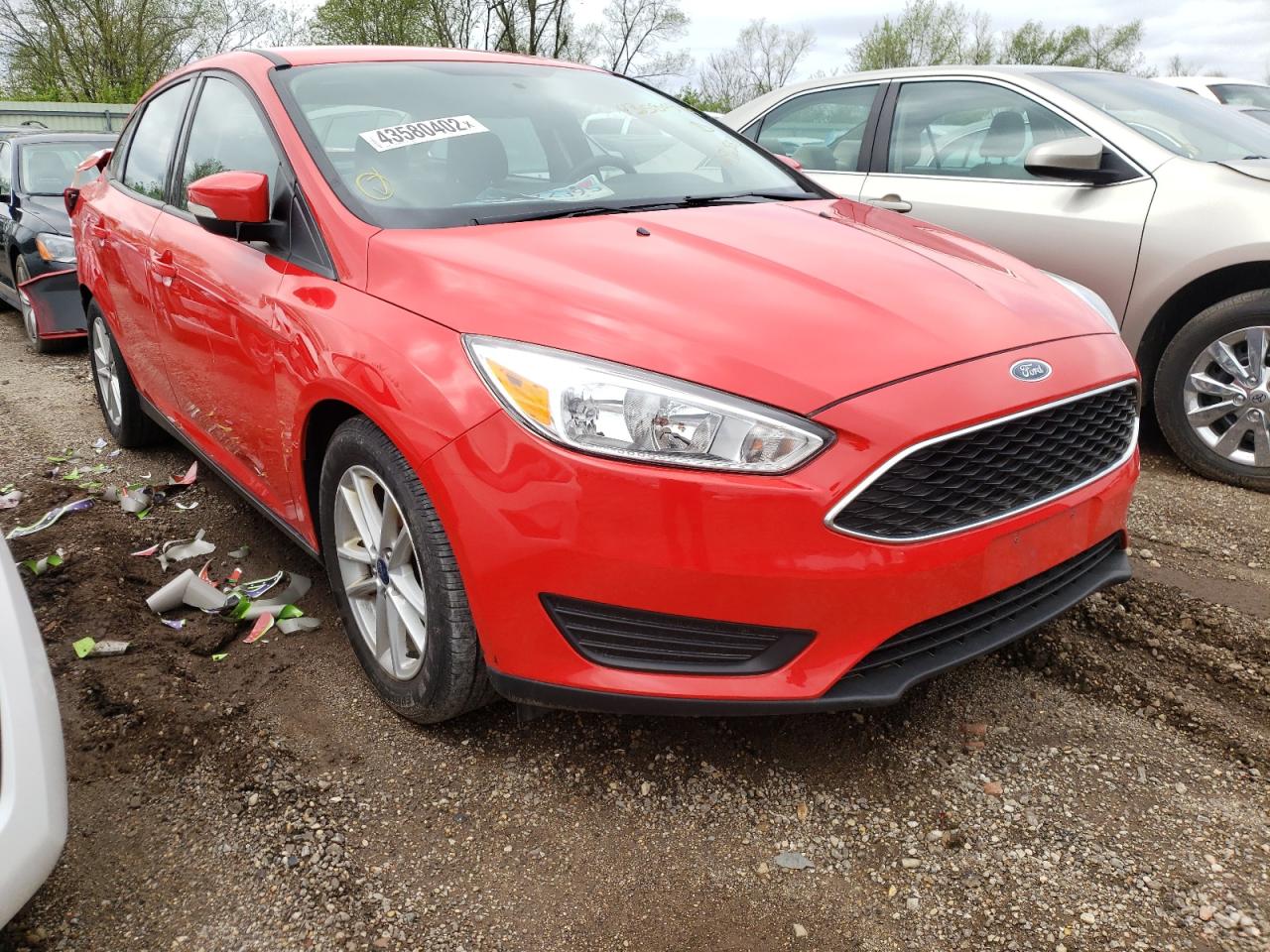 FORD FOCUS SE 2017 with VIN 1FADP3F24HL296583 - Photo from auction