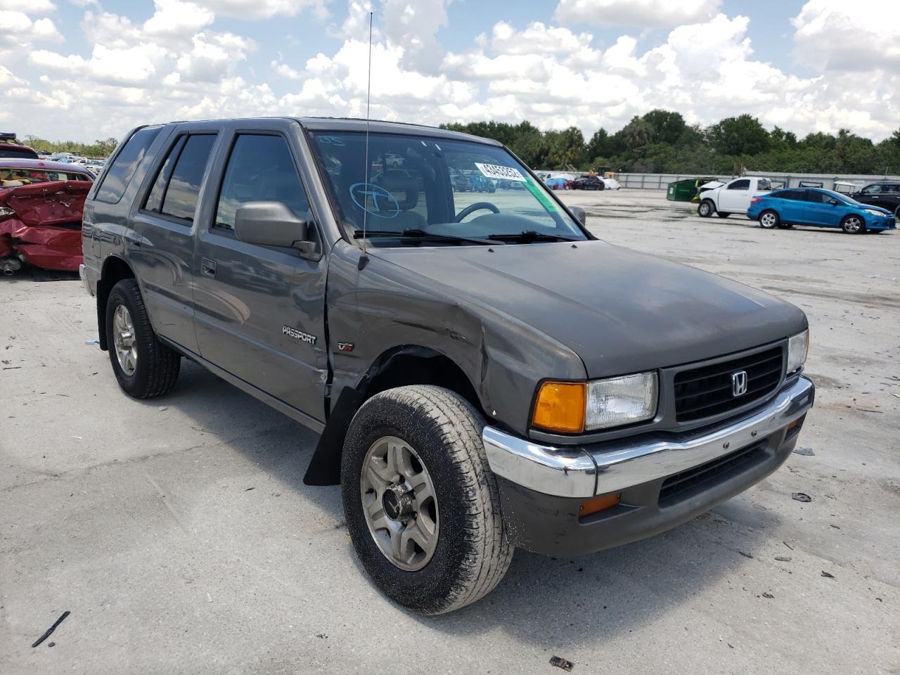 HONDA PASSPORT E 1997 with VIN 4S6CK58V6V4415752 - Photo from auction