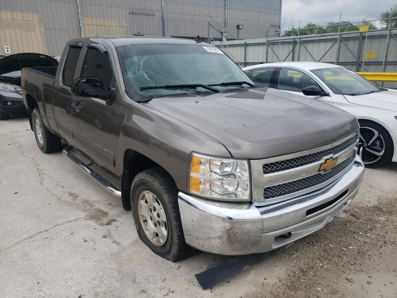 CHEVROLET SILVERADO 2013 with VIN 1GCRKSE77DZ161563 - Photo from auction