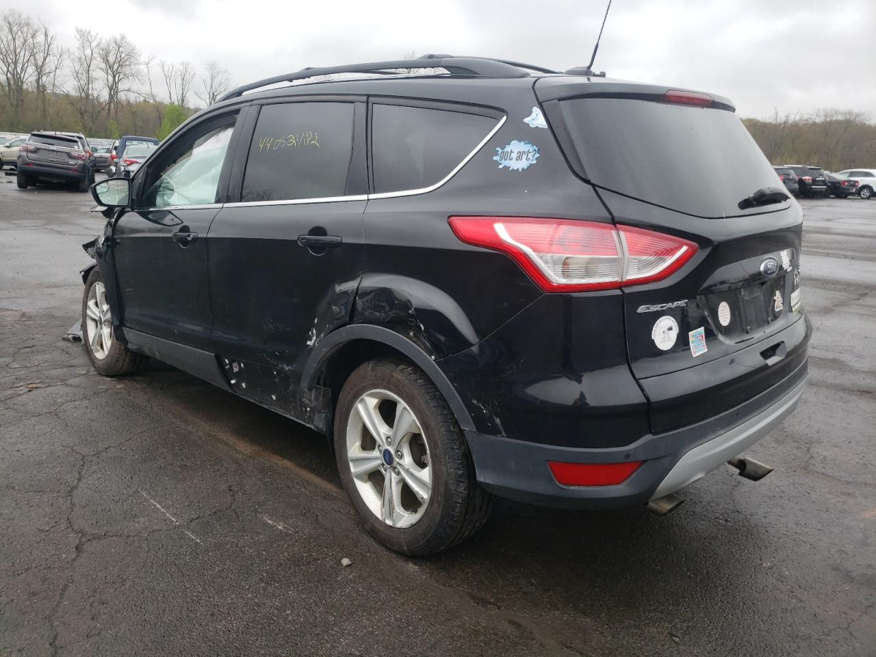 Photo 3 from auction – 2016 FORD ESCAPE SE with VIN 1FMCU9G97GUC32569