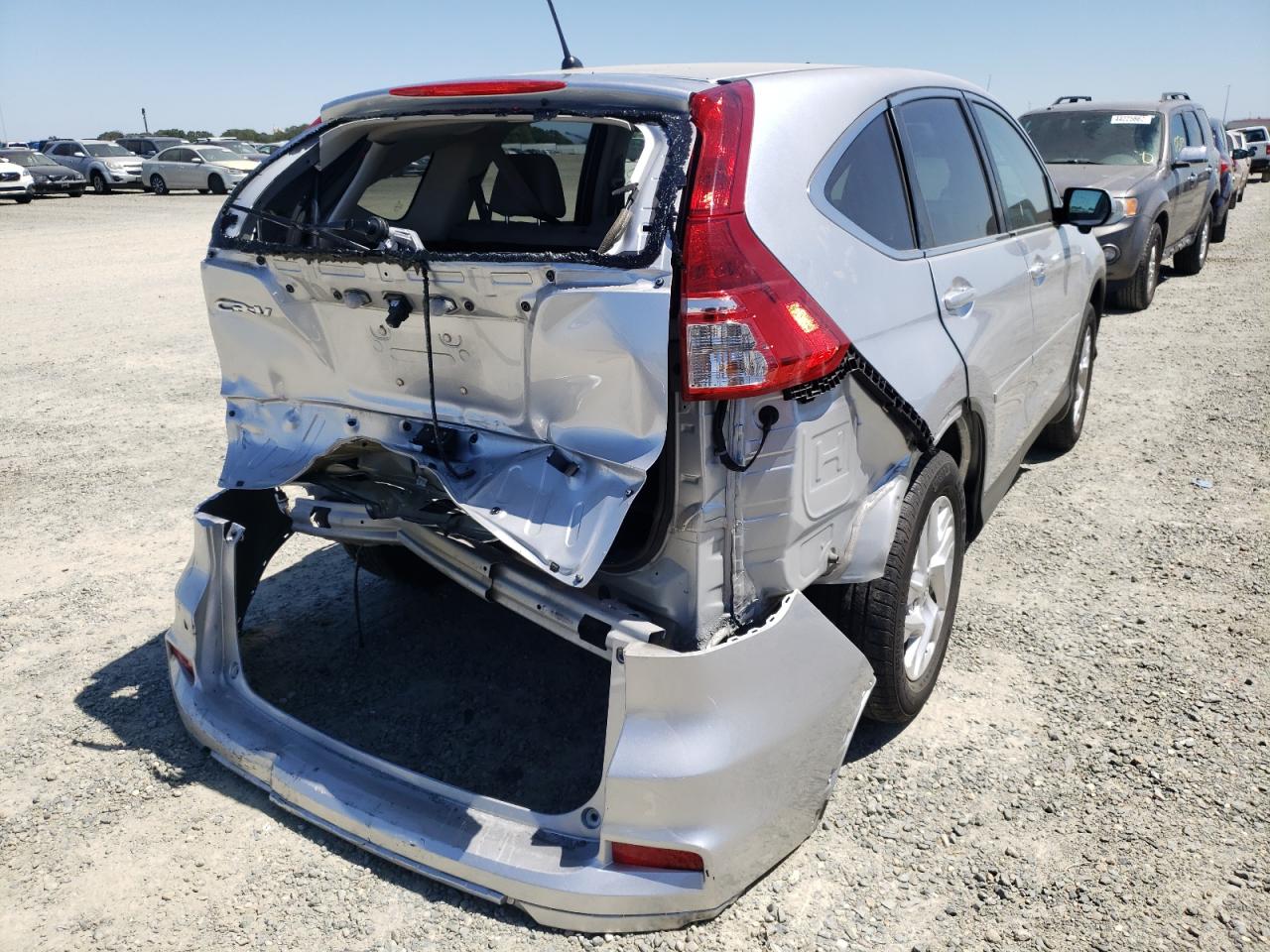 Photo 4 from auction – 2015 HONDA CR-V EX with VIN 2HKRM3H57FH519121