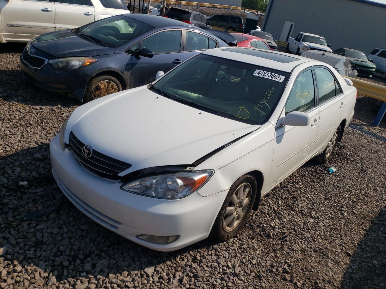 Photo 2 from auction – 2003 TOYOTA CAMRY LE with VIN 4T1BF32K83U046188
