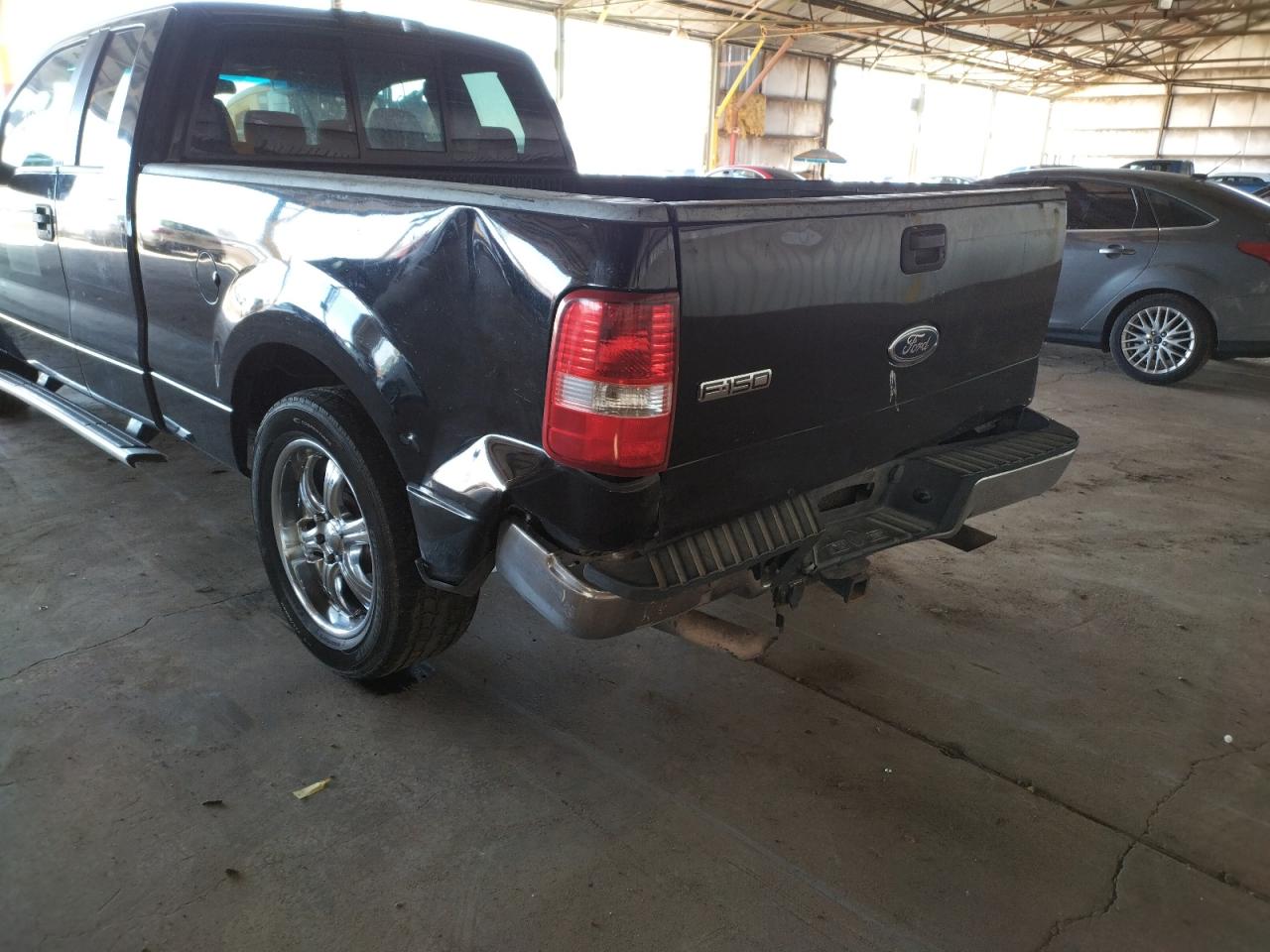 Photo 9 from auction – 2005 FORD F150 with VIN 1FTPX12545NA08699