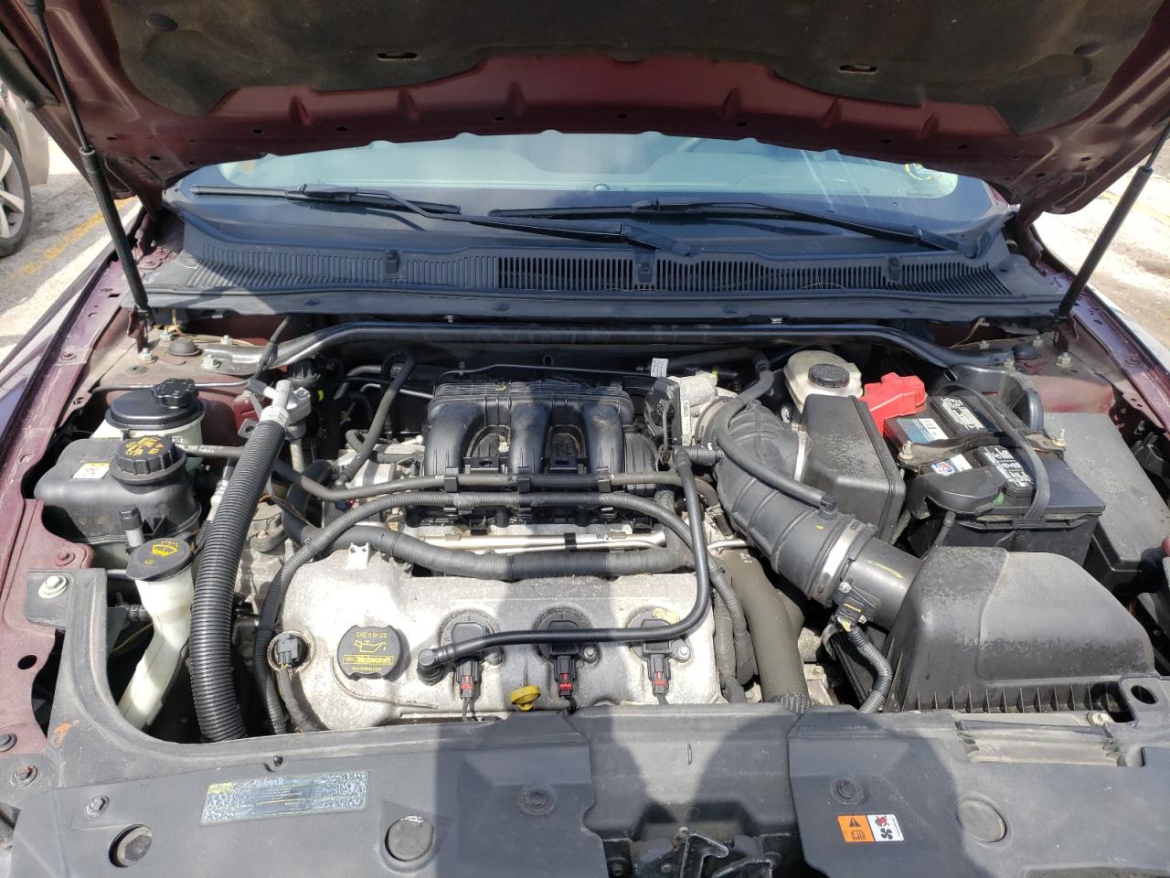 Photo 7 from auction – 2011 FORD TAURUS SE with VIN 1FAHP2DW8BG118192