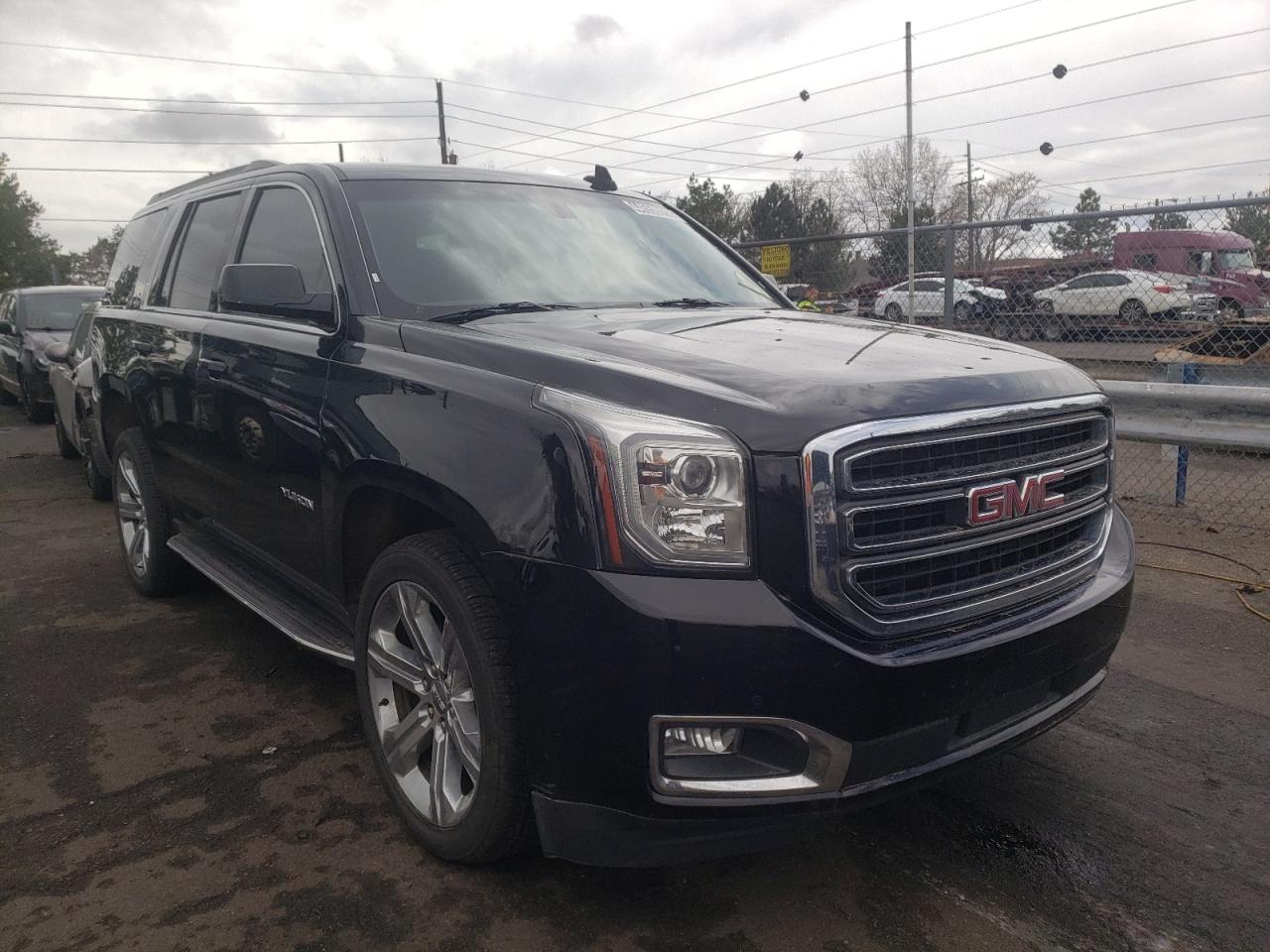 GMC YUKON SLE 2018 with VIN 1GKS2AKC2JR107861 - Photo from auction
